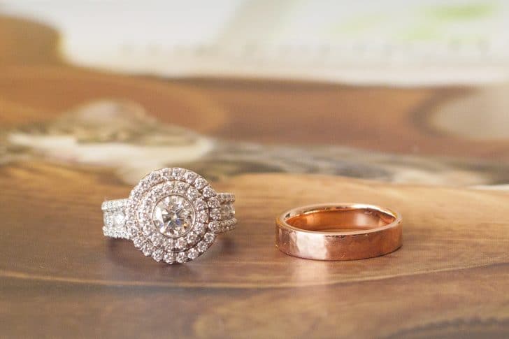 Erica Eriksdotter's wedding rings. Michael M. setting with custom made top and a 5mm rose gold, hammered, wedding band | StudioEriksdotter.com
